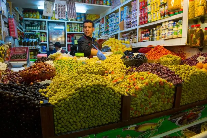 guided tour of tangier markets with colorful stalls, spices, textiles, and local crafts