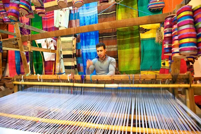 tangier walking tour through the medina bazaar, exploring traditional handicrafts, textiles, and local artisan shops
