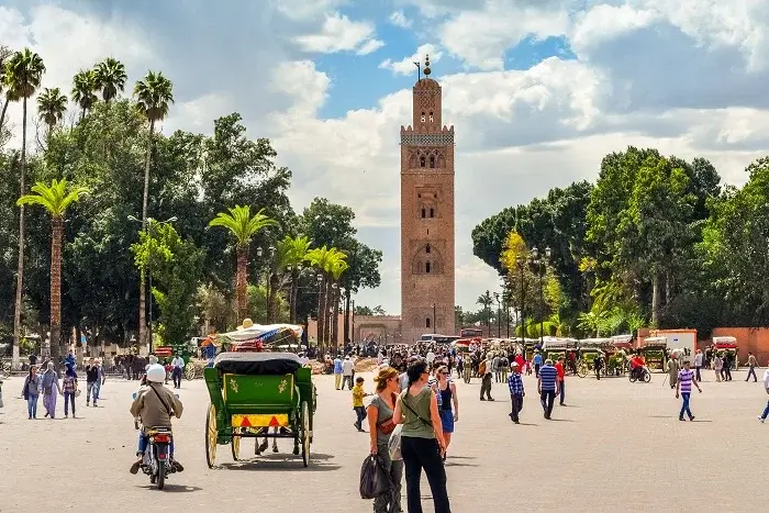 Exploring Koutoubia Mosque during a Marrakech city tour on a 12 day Morocco tour
