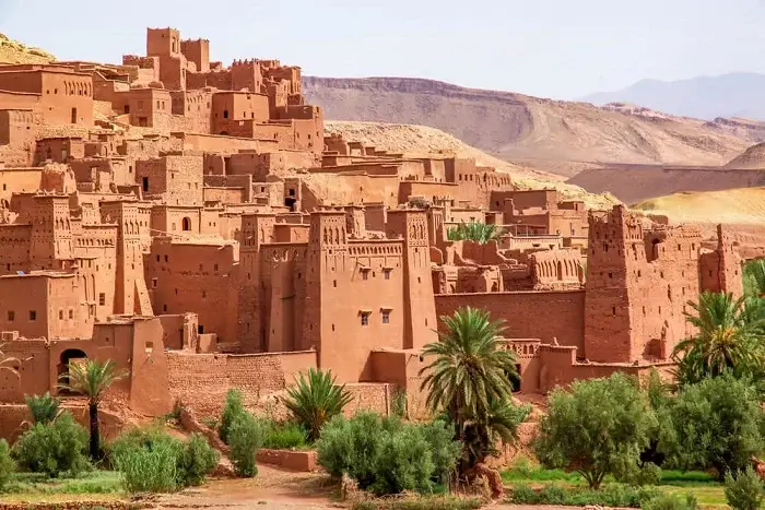 Ksar Ait Benhaddou in Morocco with traditional clay kasbah buildings on a 12 days in Morocco itinerary