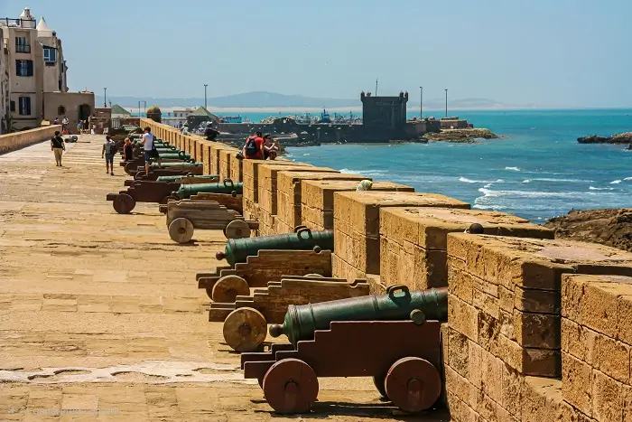 Historic cannons lining the ramparts of Skala de la Ville in Essaouira overlooking the Atlantic Ocean on a 14 day Morocco tour