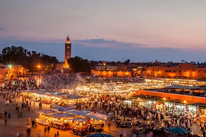 Jemaa el-Fnaa Square and Koutoubia Mosque at sunset in Marrakech during a 15 Day Grand Tour of Morocco